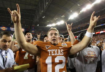 GLENDALE, AZ - JANUARY 05:  Quarterback Colt McCoy #12 of the Texas Longhorns celebrates after defeating the Ohio State Buckeyes in the Tostitos Fiesta Bowl Game on January 5, 2009 at University of Phoenix Stadium in Glendale, Arizona. The Longhorns defeated the Buckeyes 24-21  (Photo by Jed Jacobsohn/Getty Images)
