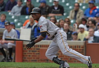 CHICAGO - MAY 27: Nyjer Morgan #3 of the Pittsburgh Pirates runs to first base after hitting the ball against the Chicago Cubs on May 27, 2009 at Wrigley Field in Chicago, Illinois. The Cubs defeated the Pirates 5-2. (Photo by Jonathan Daniel/Getty Images) 