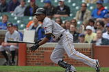 CHICAGO - MAY 27: Nyjer Morgan #3 of the Pittsburgh Pirates runs to first base after hitting the ball against the Chicago Cubs on May 27, 2009 at Wrigley Field in Chicago, Illinois. The Cubs defeated the Pirates 5-2. (Photo by Jonathan Daniel/Getty Images) 
