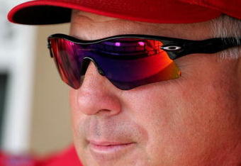 SAN FRANCISCO - JUNE 17:  Manager Mike Scioscia of the Los Angeles Angels of Anaheim sits in the dugout before their game against the San Francisco Giants at AT&T Park on June 17, 2009 in San Francisco, California.  (Photo by Ezra Shaw/Getty Images)