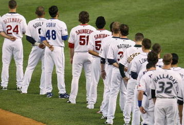 NEW YORK - JULY 15:  American League All-Stars line up at the start of the 79th MLB All-Star Game at Yankee Stadium on July 15, 2008 in the Bronx borough of New York City. (Photo by Chris McGrath/Getty Images)