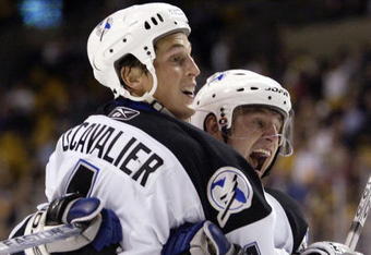 BOSTON - NOVEMBER 30:  Vincent Lecavalier #4 of the Tampa Bay Lightning and Vaclav Prospal #20 celebrate Lecavalier's goal in the third period against the Boston Bruins on November 30, 2006 at the TD Banknorth Garden in Boston, Massachusetts. The Bruins defeated the Lightning 4-3 in an overtime shootout.  (Photo by Elsa/Getty Images)