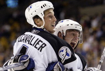 BOSTON - NOVEMBER 30:  Vincent Lecavalier #4 of the Tampa Bay Lightning and Vaclav Prospal #20 celebrate Lecavalier's goal in the third period against the Boston Bruins on November 30, 2006 at the TD Banknorth Garden in Boston, Massachusetts. The Bruins defeated the Lightning 4-3 in an overtime shootout.  (Photo by Elsa/Getty Images)