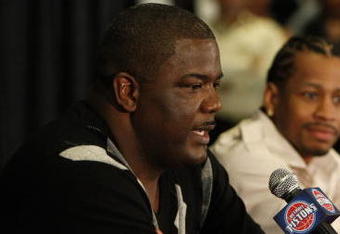 AUBURN HILLS, MI - NOVEMBER 04: President of Basketball Operations Joe Dumars of the Detroit Pistons introduces Allen Iverson #1 at press conference after being traded from the Denver Nuggets on November 4, 2008 at the Palace of Auburn Hills in Auburn Hills, Michigan. NOTE TO USER: User expressly acknowledges and agrees that, by downloading and or using this photograph, User is consenting to the terms and conditions of the Getty Images License Agreement.  (Photo by Gregory Shamus/Getty Images)