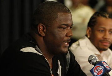 AUBURN HILLS, MI - NOVEMBER 04: President of Basketball Operations Joe Dumars of the Detroit Pistons introduces Allen Iverson #1 at press conference after being traded from the Denver Nuggets on November 4, 2008 at the Palace of Auburn Hills in Auburn Hills, Michigan. NOTE TO USER: User expressly acknowledges and agrees that, by downloading and or using this photograph, User is consenting to the terms and conditions of the Getty Images License Agreement.  (Photo by Gregory Shamus/Getty Images)
