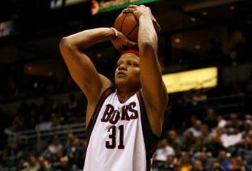 MILWAUKEE - FEBRUARY 09: Charlie Villanueva #31 of the Milwaukee Bucks puts up a shot against the Houston Rockets on February 9, 2009 at the Bradley Center in Milwaukee, Wisconsin. The Bucks defeated the Rockets 124-112. NOTE TO USER: User expressly acknowledges and agreees that, by downloading and/or using this Photograph, User is consenting to the terms and conditions of the Getty Images License Agreement. (Photo by Jonathan Daniel/Getty Images)