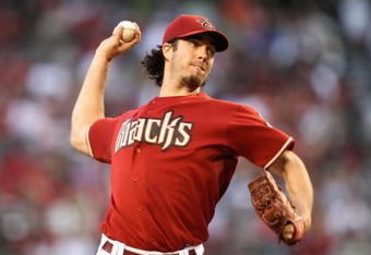 PHOENIX - MAY 12:  Starting pitcher Dan Haren #15 of the Arizona Diamondbacks pitches against the Cincinnati Reds during the major league baseball game at Chase Field on May 12, 2009 in Phoenix, Arizona.  (Photo by Christian Petersen/Getty Images)