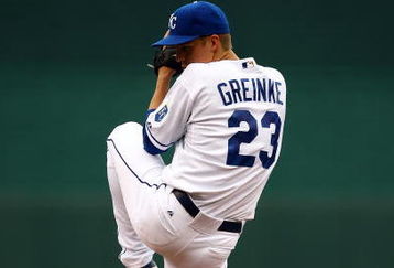 KANSAS CITY, MO - JUNE 17:  Starting pitcher Zack Greinke #23 of the Kansas City Royals pitches just prior to the start of the game against  the Arizona Diamondbacks on June 17, 2009 at Kauffman Stadium in Kansas City, Missouri.  (Photo by Jamie Squire/Getty Images)