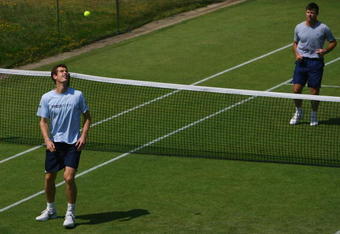 WIMBLEDON, ENGLAND - JUNE 30:  Andy Murray of Great Britain is watched by coach Miles Maclagan during a practice session on Day Eight of the Wimbledon Lawn Tennis Championships at the All England Lawn Tennis and Croquet Club on June 30, 2009 in London, England.  (Photo by Julian Finney/Getty Images)
