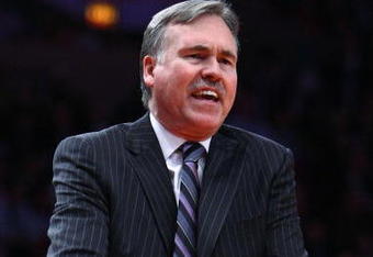 NEW YORK - MARCH 18:  Head coach Mike D'Antoni of the New York Knicks reacts at a referee against the New Jersey Nets at Madison Square Garden March 18, 2009 in New York City. NOTE TO USER: User expressly acknowledges and agrees that, by downloading and/or using this Photograph, User is consenting to the terms and conditions of the Getty Images License Agreement.  (Photo by Chris McGrath/Getty Images)