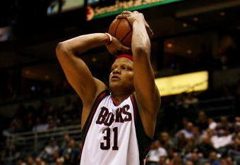 MILWAUKEE - FEBRUARY 09: Charlie Villanueva #31 of the Milwaukee Bucks puts up a shot against the Houston Rockets on February 9, 2009 at the Bradley Center in Milwaukee, Wisconsin. The Bucks defeated the Rockets 124-112. NOTE TO USER: User expressly acknowledges and agreees that, by downloading and/or using this Photograph, User is consenting to the terms and conditions of the Getty Images License Agreement. (Photo by Jonathan Daniel/Getty Images)