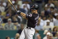 LOS ANGELES - SEPTEMBER 23: Luis Gonzalez #20 of the Arizona Diamondbacks swings at the pitch during the game against the Los Angeles Dodgers at Dodger Stadium during the game on September 23, 2006 in Los Angeles, California.  (Photo by Jeff Gross/Getty Images) 