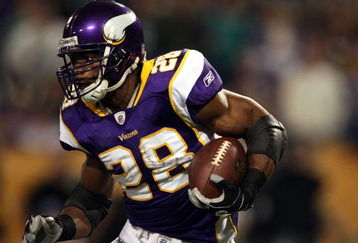 MINNEAPOLIS - JANUARY 4:   Adrian Peterson #28 of the Minnesota Vikings carries the ball in the first half against the Philadelphia Eagles during the NFC Wild Card playoff game on January 4,2009 at the Hubert H. Humphrey Metrodome in Minneapolis, Minnesota. (Photo by Elsa/Getty Images)