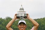 BETHESDA, MD - JULY 6: Anthony Kim holds the championship trophy after winning the AT&T National at Congressional Country Club on July 6, 2008 in Bethesda, Maryland. (Photo by Hunter Martin/Getty Images)
