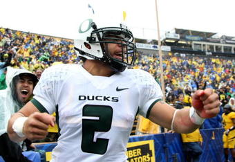 BERKELEY, CA - NOVEMBER 01:  Jeremiah Masoli #2 of the Oregon Ducks celebrates after scoirng a touchdown against the California Golden Bears during an NCAA football game on November 1, 2008 at Memorial Stadium in Berkeley, California.  (Photo by Jed Jacobsohn/Getty Images)