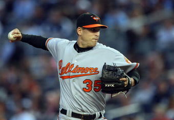NEW YORK - MAY 19:  Brad Bergesen #64 of the Baltimore Orioles pitches against the New York Yankees on May 19, 2009 at Yankee Stadium in the Bronx borough of New York City.  The Yankees defeated the Orioles 9-1.  (Photo by Jim McIsaac/Getty Images)