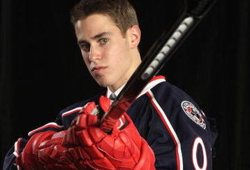 MONTREAL, QC - JUNE 26: John Moore of the Columbus Blue Jackets poses for a photo after he was selected #21 overall during the first round of the 2009 NHL Entry Draft at the Bell Centre on June 26, 2009 in Montreal, Quebec, Canada. (Photo by Jamie Squire/Getty Images)