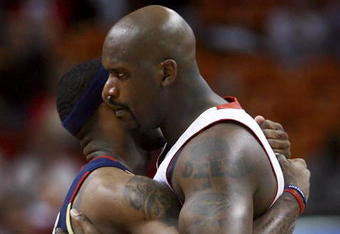 MIAMI - FEBRUARY 01:  Shaquille O'Neal #32 of the Miami Heat greets LeBron James #23 of the Cleveland Cavaliers before the game at American Airlines Arena February 1, 2007 in Miami, Florida. NOTE TO USER: User expressly acknowledges and agrees that, by downloading and or using this photograph, User is consenting to the terms and conditions of the Getty Images License Agreement.  (Photo by Doug Benc/Getty Images)