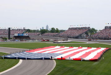 INDIANAPOLIS - MAY 25:  Military personel hold a giant American Flag during the National Anthem during the IRL IndyCar Series 92nd running of the Indianapolis 500 at the Indianapolis Motor Speedway May 25, 2008 in Indianapolis, Indiana.  (Photo by Donald Miralle/Getty Images)