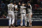 ATLANTA - MARCH 31: Right fielder Xavier Nady #22 of the Pittsburgh Pirates is greeted by teammates Jason Bay #38, Nate McLouth #13 and Ryan Doumit #41 after his 12th inning 3-run home run during the game against the Atlanta Braves at Turner Field March 31, 2008 in Atlanta, Georgia.  The Pirates won 12-11 in 12 innings. (Photo by Mike Zarrilli/Getty Images)