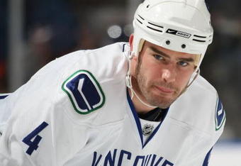 UNIONDALE, NY - NOVEMBER 17: Rob Davison #4 of the Vancouver Canucks takes part in warmups prior to his game against the New York Islanders on November 17, 2008 at the Nassau Coliseum in Uniondale, New York. (Photo by Bruce Bennett/Getty Images)