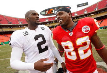 KANSAS CITY, MO - SEPTEMBER 14:  Former LSU teammates Dwayne Bowe #82 of the Kansas City Chiefs and JaMarcus Russell #2 of the Oakland Raiders share a word after their NFL game at Arrowhead Stadium on September 14, 2008 in Kansas City, Missouri. The Raiders defeated the Chiefs 23-8. (Photo by Jamie Squire/Getty Images)