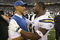 INDIANAPOLIS - JANUARY 13:  Head coach Tony Dungy of the Indianapolis Colts congratulates LaDainian Tomlinson #21 of the San Diego Chargers after the CHargers defeated the Colts 28-24 during their AFC Divisional Playoff game at the RCA Dome on January 13, 2008 in Indianapolis, Indiana.  (Photo by Streeter Lecka/Getty Images)