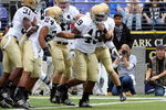 BALTIMORE - NOVEMBER 15:  Toryan Smith #49 of the Notre Dame Fighting Irish celebrates his first quarter touchdown with his teammates after he returned a blocked punt against the Navy Midshipmen on November 15, 2008 at M&T Bank Stadium in Baltimore, Maryland.  (Photo by Jim McIsaac/Getty Images)