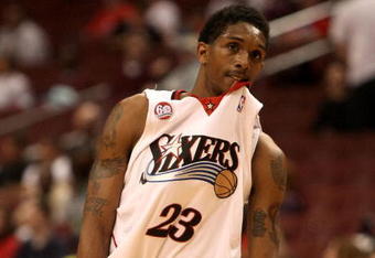 PHILADELPHIA - APRIL 30:  Lou Williams #23 of the Philadelphia 76ers walks with his jersey in his mouth against the Orlando Magic during Game Six of the Eastern Conference Quarterfinals at Wachovia Center on April 30, 2009 in Philadelphia, Pennsylvania. NOTE TO USER: User expressly acknowledges and agrees that, by downloading and or using this photograph, User is consenting to the terms and conditions of the Getty Images License Agreement.  (Photo by Nick Laham/Getty Images)