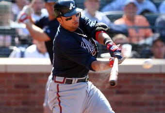 NEW YORK - MAY 13:  Martin Prado #14 of the Atlanta Braves bats against the New York Mets on May 13, 2009 at Citi Field in the Flushing neighborhood of the Queens borough of New York City. The Braves defeated the Mets 8-7 in twelve innings.  (Photo by Jim McIsaac/Getty Images)