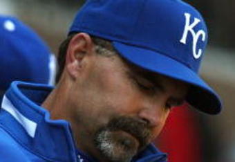 CHICAGO - APRIL 7: Manager Trey Hillman #22 of the Kansas City Royals makes notes during the Opening Day game against the Chicago White Sox on April 7, 2009 at U.S. Cellular Field in Chicago, Illinois. The White Sox defeated the Royals 4-2. (Photo by Jonathan Daniel/Getty Images)