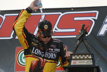 MEMPHIS, TN - JUNE 27: Ron Hornaday Jr., driver of the #33 Longhorn Chevrolet tries to cool down after winning the MemphisTravel.com 200 Camping World Truck Series race at the Memphis Motorsports Park on June 27, 2009 in Memphis, Tennessee.   (Photo by John Sommers II/Getty Images)