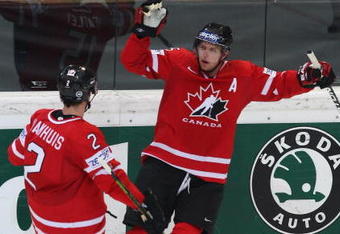 BERN, SWITZERLAND - MAY 07:  Dany Heatley of Canada celebrates with team-mate Dan Hamhuis after scoring during the IIHF World Championship Quarter-Final between Canada and Latvia at the PostFinance Arena on May 7, 2009 in Bern, Switzerland.  (Photo by Mike Hewitt/Getty Images)