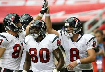 GLENDALE, AZ - AUGUST 18:  Quarterback Matt Schaub #8 of the Houston Texans celebrates with receivers Andre Johnson #80 and Mark Bruener #87 after running five yards for a touchdown against the Arizona Cardinals during their NFL preseason game at University of Phoenix Stadium August 18, 2007 in Glendale, Arizona.  The Texans won 33-20. (Photo by Stephen Dunn/Getty Images)