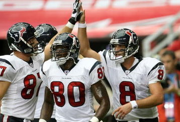 GLENDALE, AZ - AUGUST 18:  Quarterback Matt Schaub #8 of the Houston Texans celebrates with receivers Andre Johnson #80 and Mark Bruener #87 after running five yards for a touchdown against the Arizona Cardinals during their NFL preseason game at University of Phoenix Stadium August 18, 2007 in Glendale, Arizona.  The Texans won 33-20. (Photo by Stephen Dunn/Getty Images)