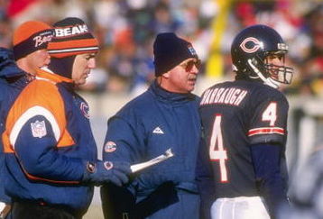 14 Dec 1991:  Head coach Mike Ditka of the Chicago Bears, center, talks with quarterback Jim Harbaugh #4 during the Bears 27-0 victory over the Tampa Bay Buccaneers at Soldier Field in Chicago, Illinois.  Mandatory Credit: Jonathan Daniel  /Allsport