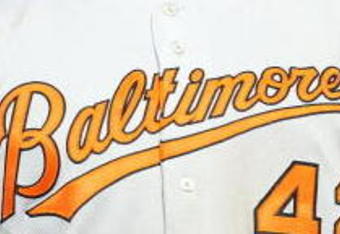 ARLINGTON, TX - APRIL 15:  Third baseman Ty Wigginton of the Baltimore Orioles while wearing jersey #42 to commemorate Jackie Robinson day during a game against the Texas Rangers on April 15, 2009 at Rangers Ballpark in Arlington, Texas.  (Photo by Ronald Martinez/Getty Images)