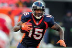 DENVER - DECEMBER 9:  Brandon Marshall #15 of the Denver Broncos heads upfield with a reception in the first half of the football game against the Kansas City Chiefs at Invesco Field at Mile High December 9, 2007 in Denver, Colorado.  (Photo by Steve Dykes/Getty Images)