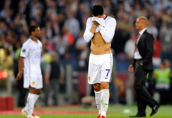 ROME, ITALY - MAY 27:  Cristiano Ronaldo (R) of Manchester United reacts after the UEFA Champions League Final match between Barcelona and Manchester United at the Stadio Olimpico on May 27, 2009 in Rome, Italy.  (Photo by Claudio Villa/Getty Images)