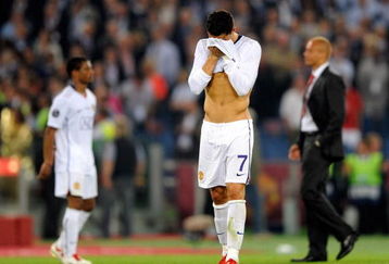 ROME, ITALY - MAY 27:  Cristiano Ronaldo (R) of Manchester United reacts after the UEFA Champions League Final match between Barcelona and Manchester United at the Stadio Olimpico on May 27, 2009 in Rome, Italy.  (Photo by Claudio Villa/Getty Images)