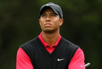 FARMINGDALE, NY - JUNE 22:  Tiger Woods waits on the 14th tee during the continuation of the final round of the 109th U.S. Open on the Black Course at Bethpage State Park on June 22, 2009 in Farmingdale, New York.  (Photo by Ross Kinnaird/Getty Images)
