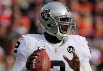 DENVER - NOVEMBER 23:  Quarterback JaMarcus Russell #2 of the Oakland Raiders delivers a pass against the Denver Broncos during week 12 NFL action at Invesco Field at Mile High on November 23, 2008 in Denver, Colorado. The Raiders defeated the Broncos 31-10.  (Photo by Doug Pensinger/Getty Images)