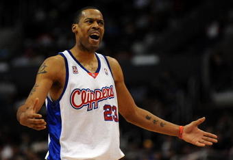 LOS ANGELES, CA - JANUARY 14:  Marcus Camby #23 of the Los Angeles Clippers complains for a foul against the Atlanta Hawks during the second half at the Staples Center on January 14, 2009 in Los Angeles, California.   The Hawks won 97-80.  NOTE TO USER: User expressly acknowledges and agrees that, by downloading and/or using this Photograph, user is consenting to the terms and conditions of the Getty Images License Agreement.  (Photo by Harry How/Getty Images)