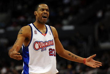 LOS ANGELES, CA - JANUARY 14:  Marcus Camby #23 of the Los Angeles Clippers complains for a foul against the Atlanta Hawks during the second half at the Staples Center on January 14, 2009 in Los Angeles, California.   The Hawks won 97-80.  NOTE TO USER: User expressly acknowledges and agrees that, by downloading and/or using this Photograph, user is consenting to the terms and conditions of the Getty Images License Agreement.  (Photo by Harry How/Getty Images)