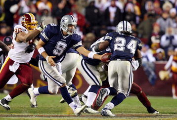 LANDOVER, MD - NOVEMBER 16:  Tony Romo #9 of the Dallas Cowboys hands the ball to teammate Marian Barber #24 during their game against the Washington Redskins on November 16, 2008 at FedEx Field in Landover, Maryland.  (Photo by Jim McIsaac/Getty Images)
