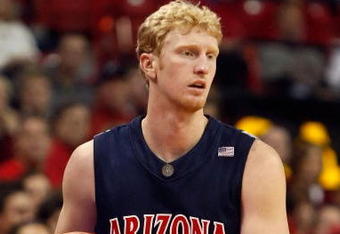 LAS VEGAS - DECEMBER 20:  Chase Budinger #34 of the Arizona Wildcats holds the ball against the UNLV Rebels at the Thomas & Mack Center December 20, 2008 in Las Vegas, Nevada.  (Photo by Ethan Miller/Getty Images)