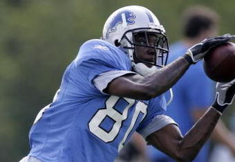ALLEN PARK, MI - JULY 28:  Charles Rogers #80 of the Detroit Lions catches a ball during training camp at the Detroit Lions Headquarters and Training Facility on July 28, 2006 in Allen Park, Michigan.  (Photo by Gregory Shamus/Getty Images)