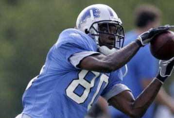 ALLEN PARK, MI - JULY 28:  Charles Rogers #80 of the Detroit Lions catches a ball during training camp at the Detroit Lions Headquarters and Training Facility on July 28, 2006 in Allen Park, Michigan.  (Photo by Gregory Shamus/Getty Images)
