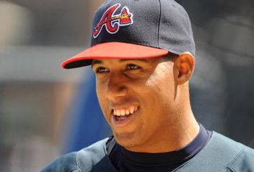 ATLANTA - APRIL 12: Infielder Yunel Escobar #19 of the Atlanta Braves watches batting practice before play against the Washington Nationals April 12, 2009 at Turner Field in Atlanta, Georgia.  (Photo by Al Messerschmidt/Getty Images)