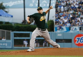 LOS ANGELES, CA - JUNE 16:  Dallas Braden #51 of the Oakland Athletics pitches against the Los Angeles Dodgers at Dodger Stadium on June 16, 2009 in Los Angeles, California.  (Photo by Jeff Gross/Getty Images)